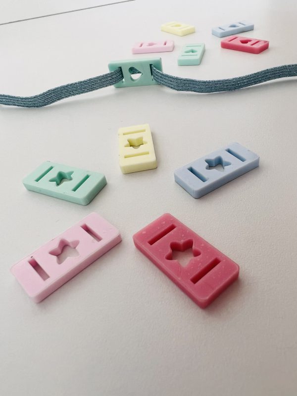 Plaquitas para elástico plano pastel